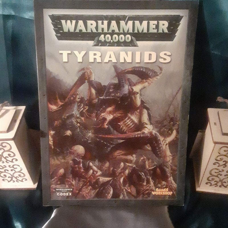 Warhammer 40k Codex Tyranids 2004 Gamesworkshop
64 pages long.  Good shape paperback book