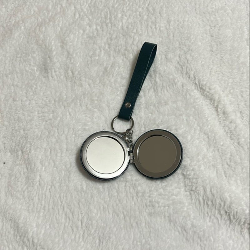 Evocation keychain mirror