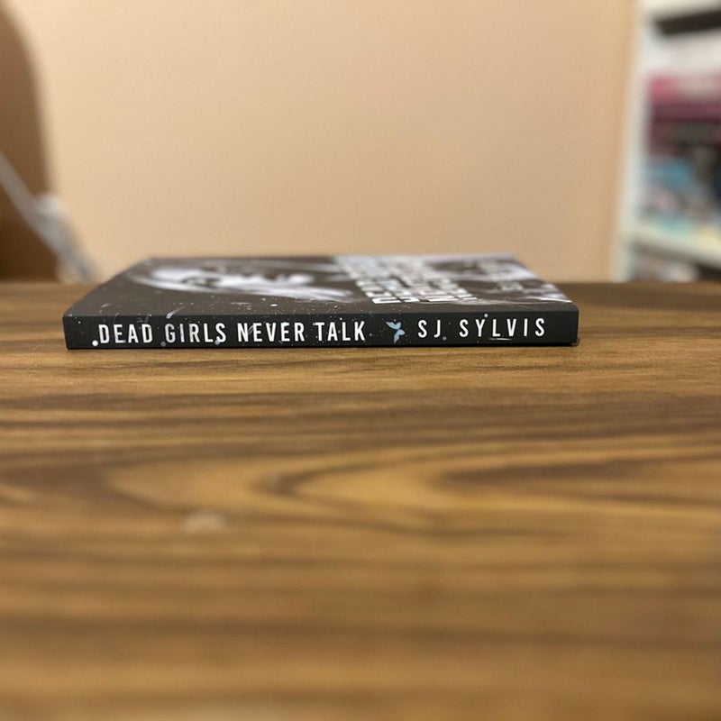 Dead girls never talk by SJ Sylvis