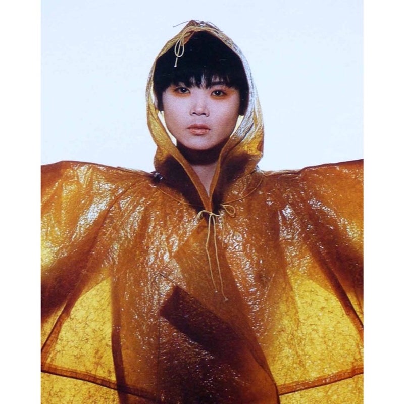Issey Miyake's Japanese Paper Coat worn by Model Jun Kano