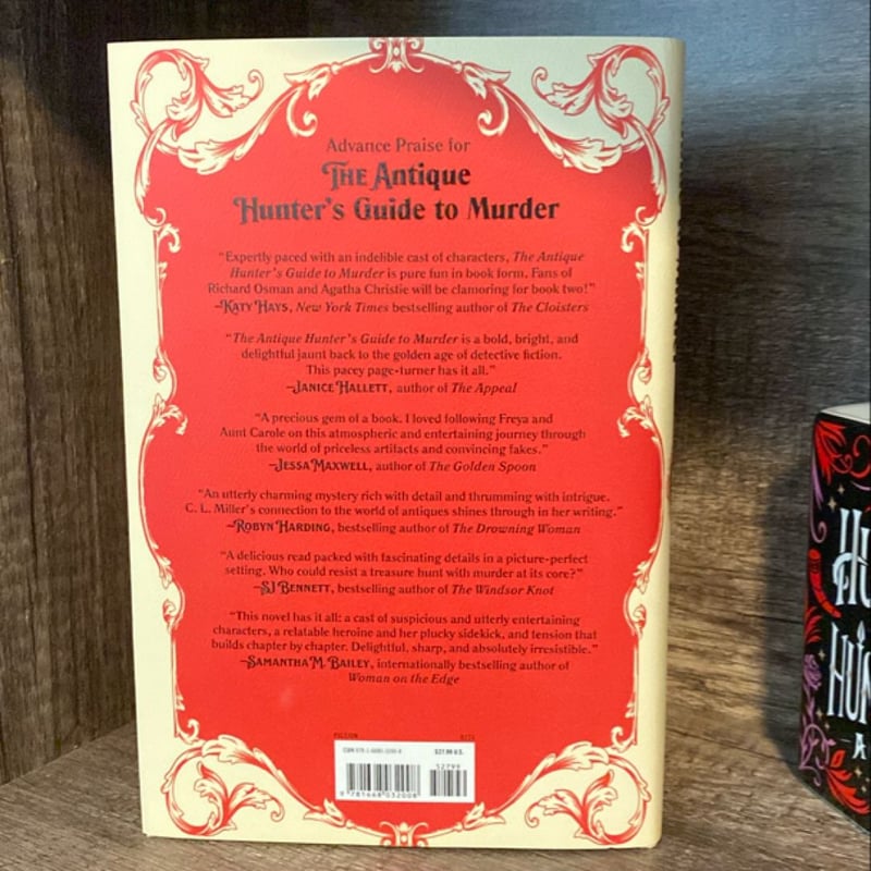 The Antique Hunter's Guide to Murder by C. L. Miller