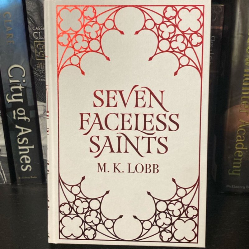 Fairyloot Edition of Seven Faceless Saints by M, Hardcover | Pangobooks