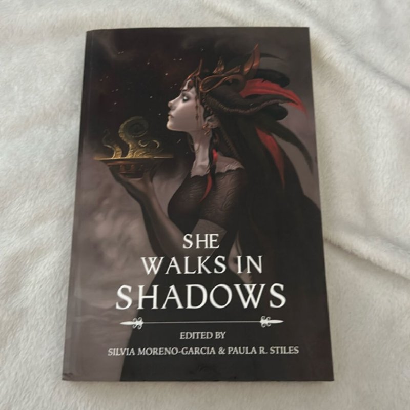 She Walks in Shadows