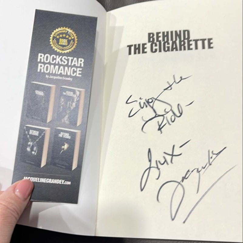 Behind the cigarette *signed