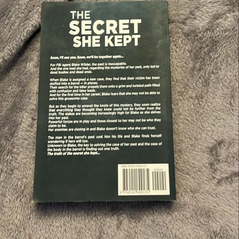 The Secret She Kept