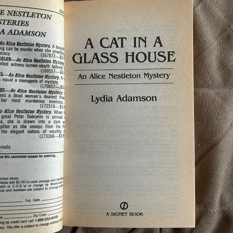A Cat in a Glass House 815
