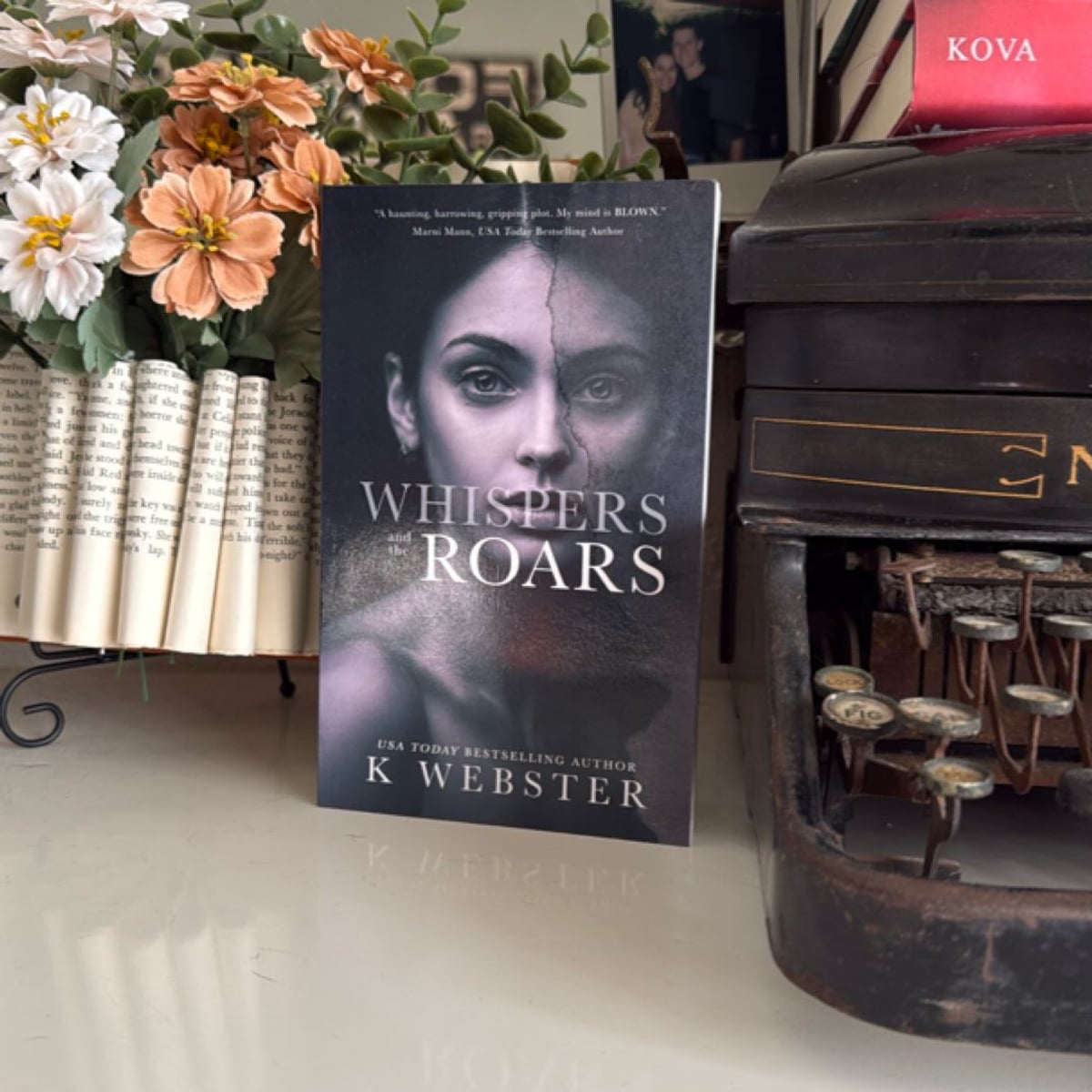 Whispers and the Roars by K. Webster