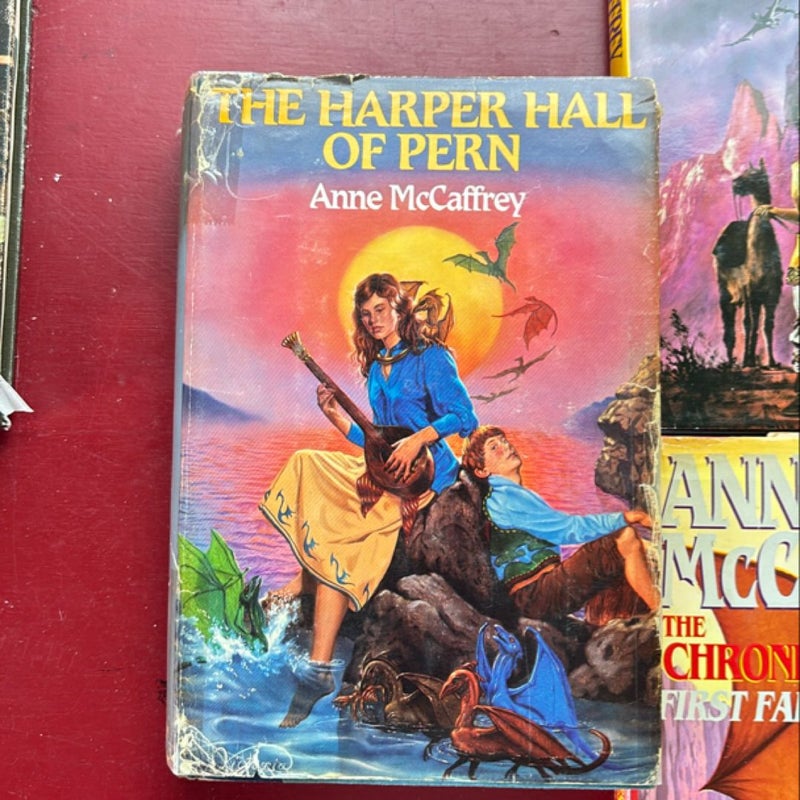 5 Hardcover Pern Books: first fall, renegades, Harper Hall of Pern, nerilka’s story, weyrs of pern. 