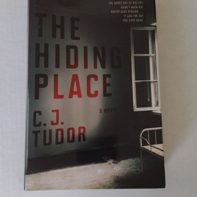 The Hiding Place by C. J. Tudor Hardcover Pangobooks