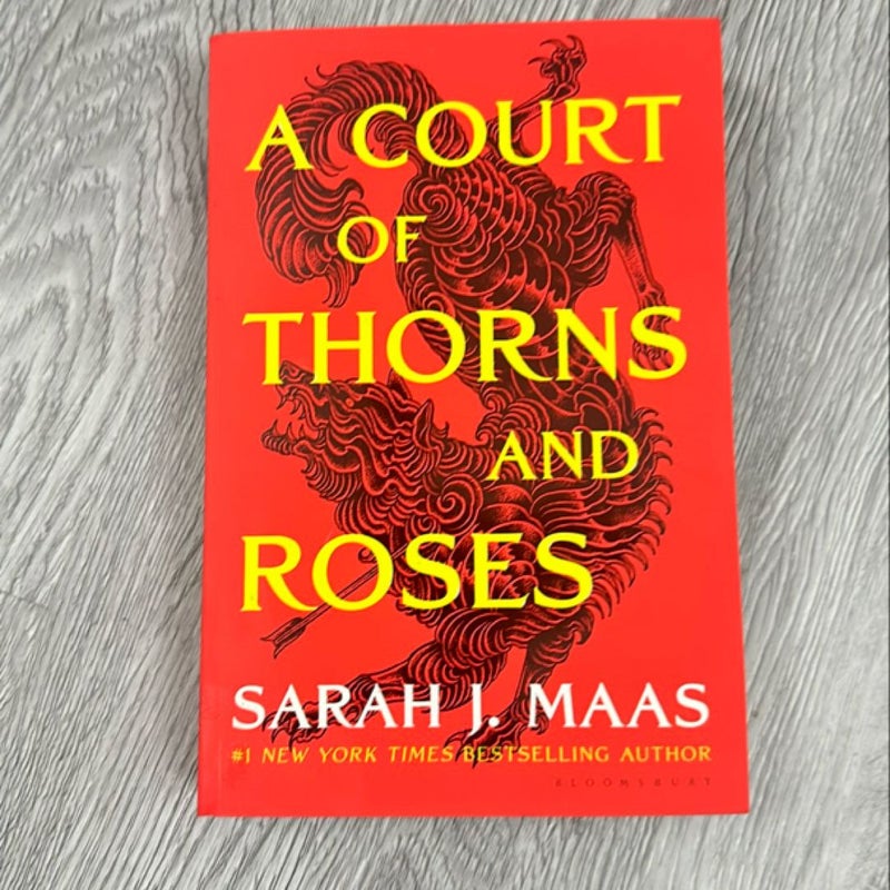 NEW- A Court of Thorns and Roses