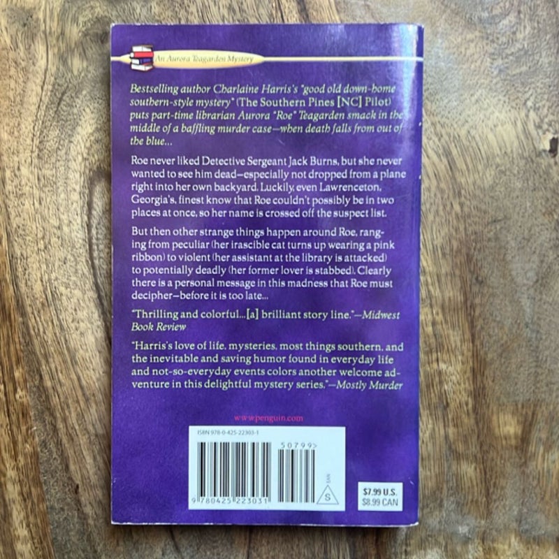 Dead Over  Heels (Aurora Teagarden Murder Mystery No. 5)