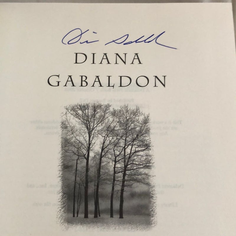 A Breath of Snow and Ashes (Signed)