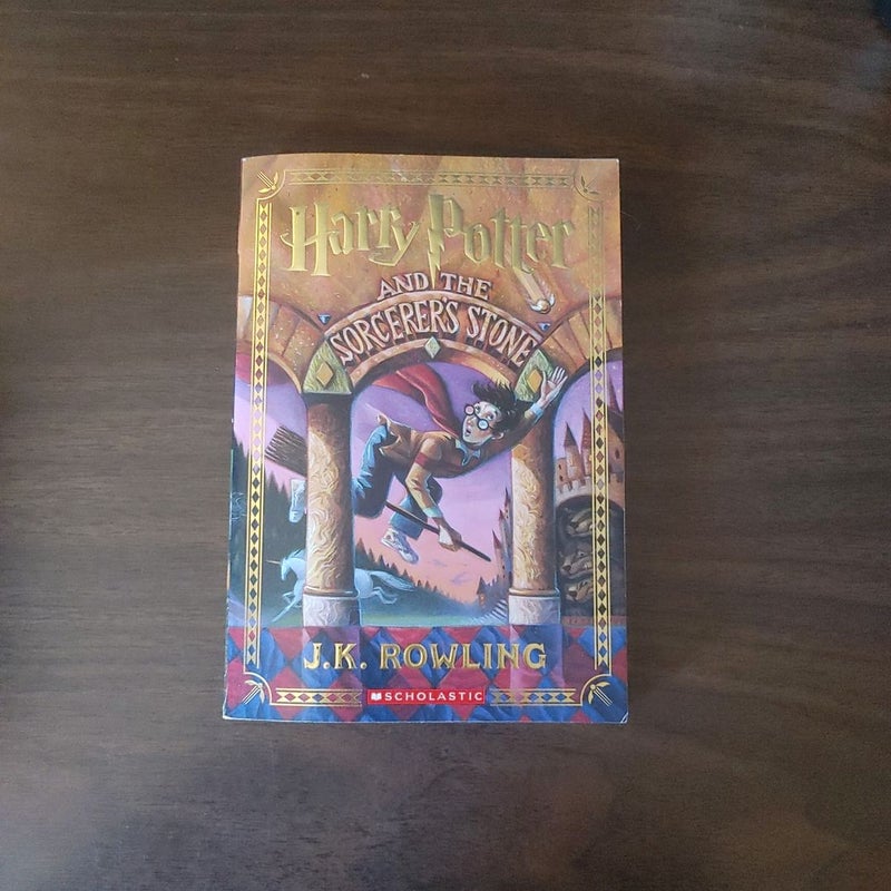 Harry Potter and the Sorcerer's Stone (Harry Potter, Book 1) by J. K.  Rowling, Paperback