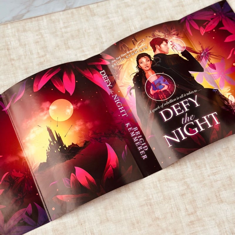 Signed Defy the Night with reversed dust jacket