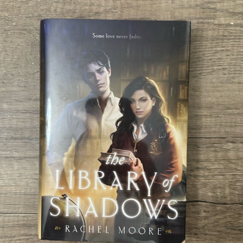 The Library of Shadows by Rachel Moore