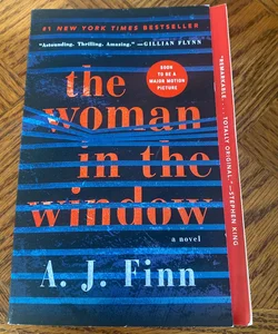 The Woman in the Window- floppy trade paperback
