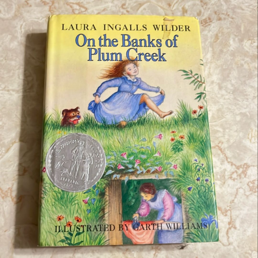 On The Banks Of Plum Creek (Little House Series) – Hardcover, Good Condition, 1953 Edition