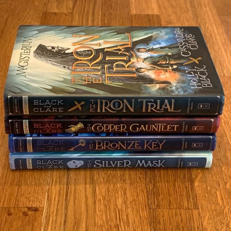 Magisterium, books 1-4 The Iron Trial / The Copper Gauntlet / The Bronze Key / The Silver Mask