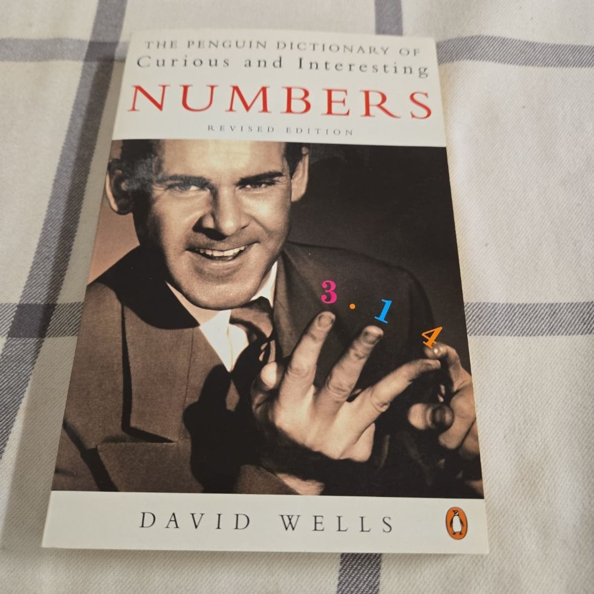 The Penguin Dictionary of Curious and Interesting Numbers by David Wells