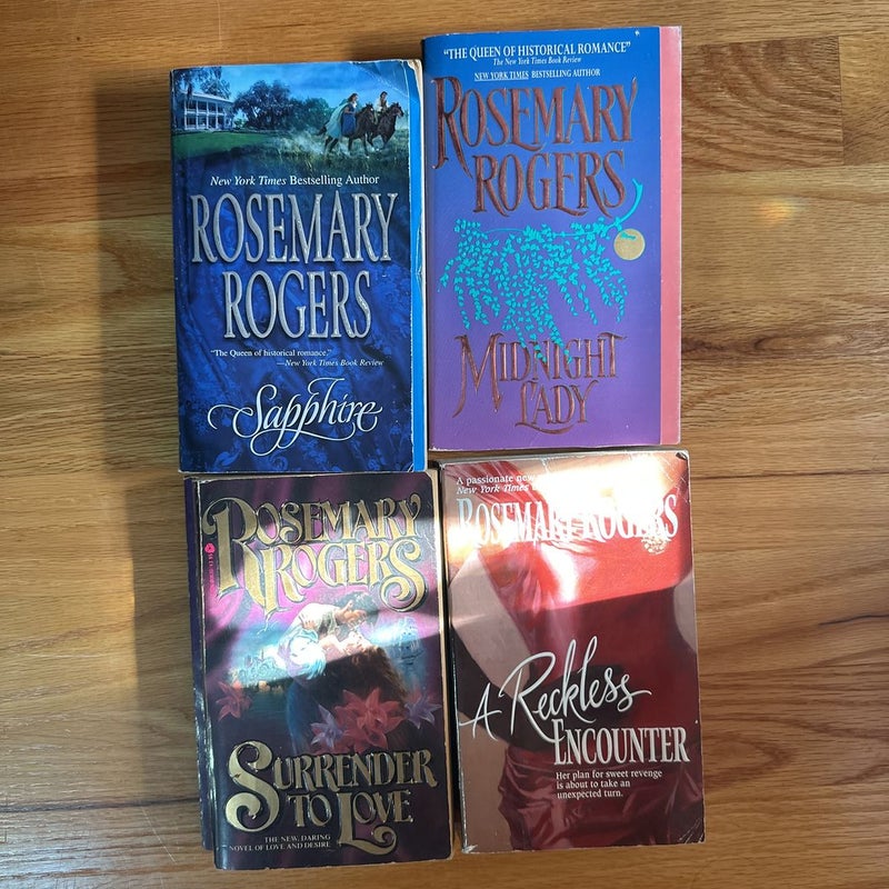 Lot of 4 paperback books - Surrender to Love,  plus 3 more 