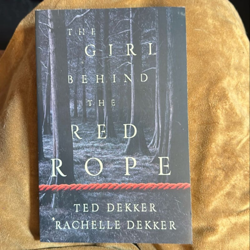 The Girl Behind the Red Rope