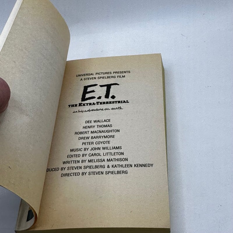 E. T.