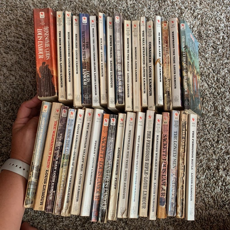 Collection of 35 Louis L'Amour novels by Louis L'Amour , Paperback