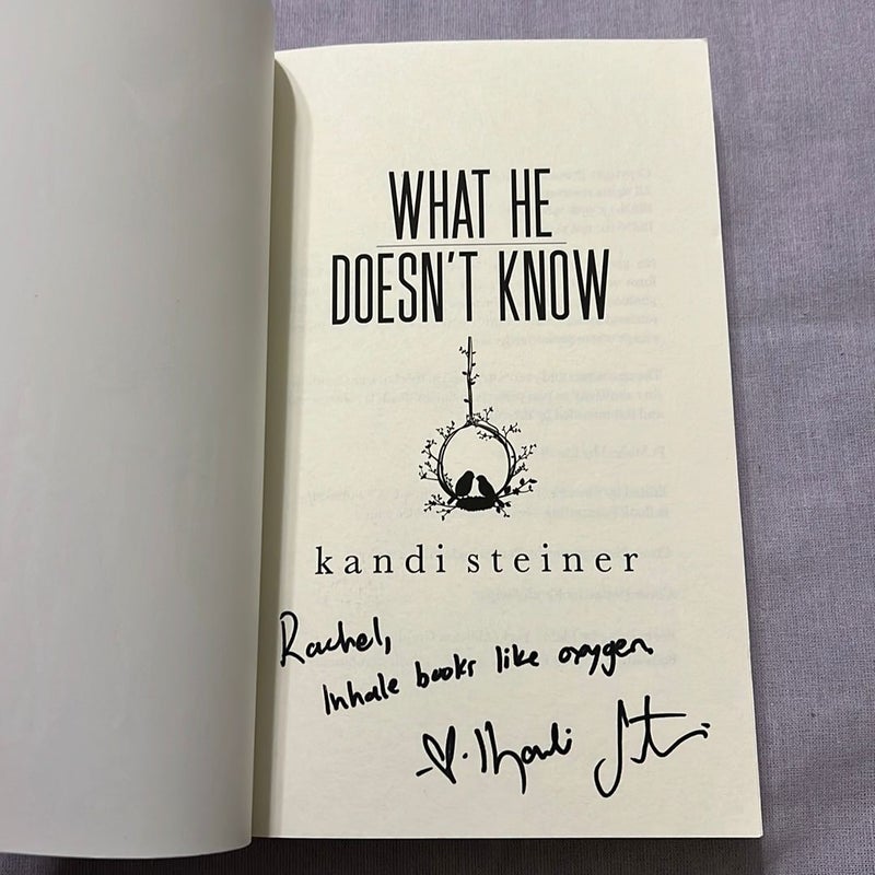 What He Doesn't Know (signed) 