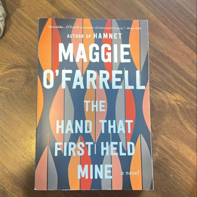 The Hand That First Held Mine