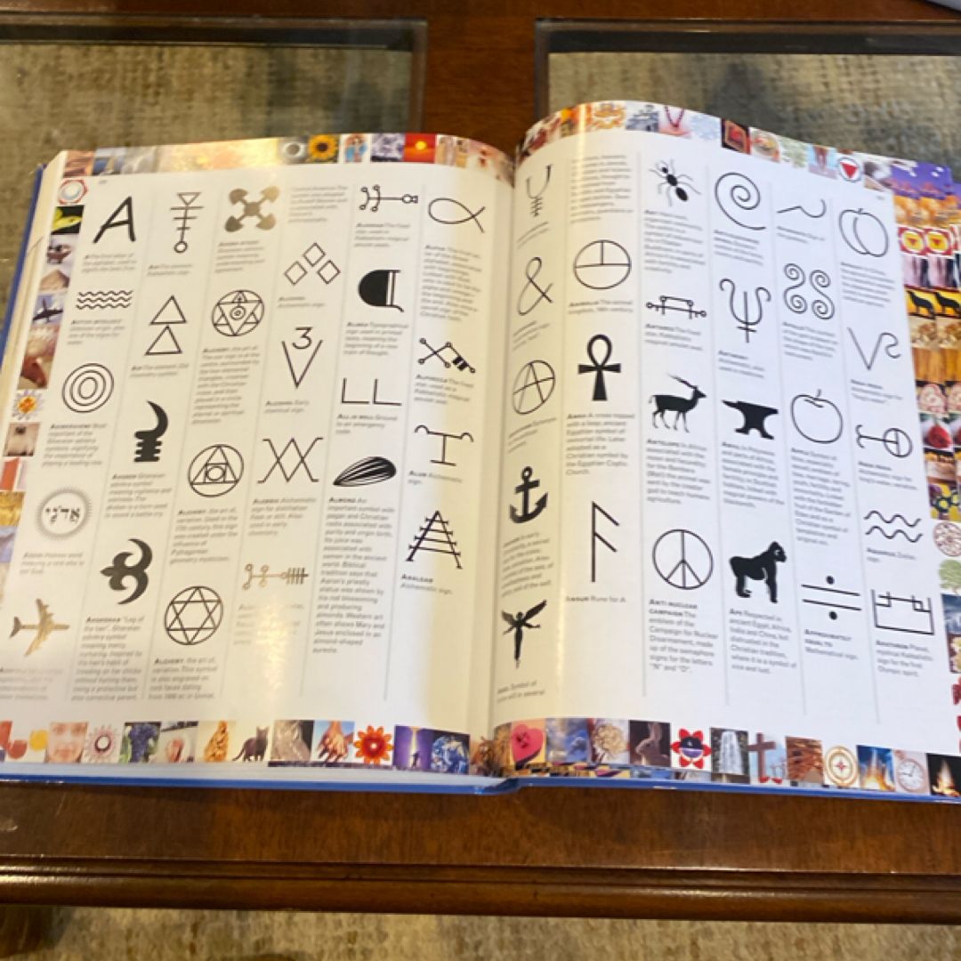 The Complete Encyclopedia of Signs and Symbols by Mark O'Connell