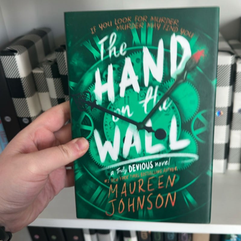 The Hand on the Wall