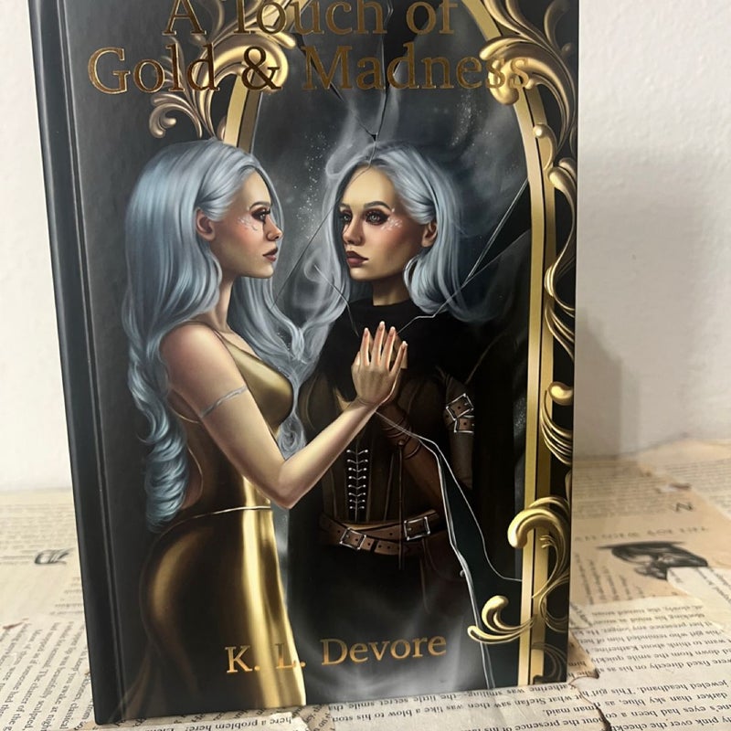 A Touch Of Gold And Madness by k. L. Devore Ink the pages