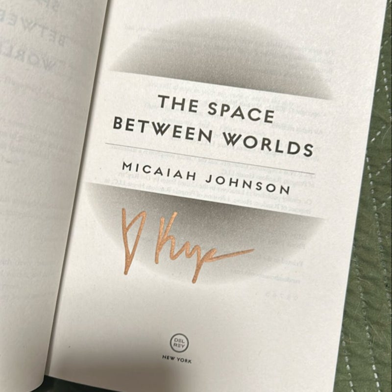 SIGNED The Space Between Worlds