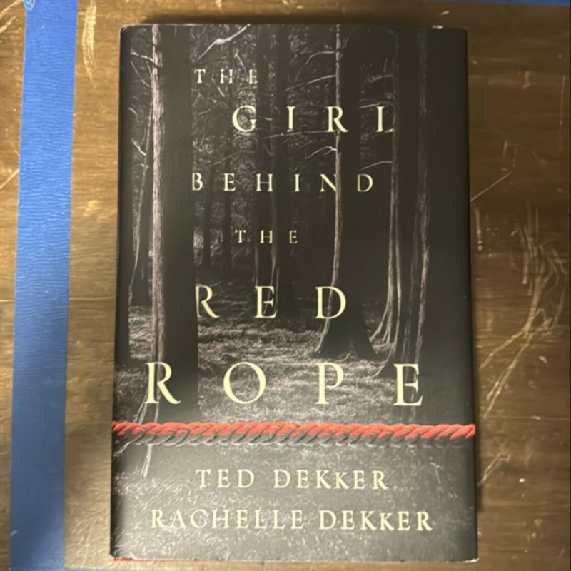 The Girl Behind the Red Rope