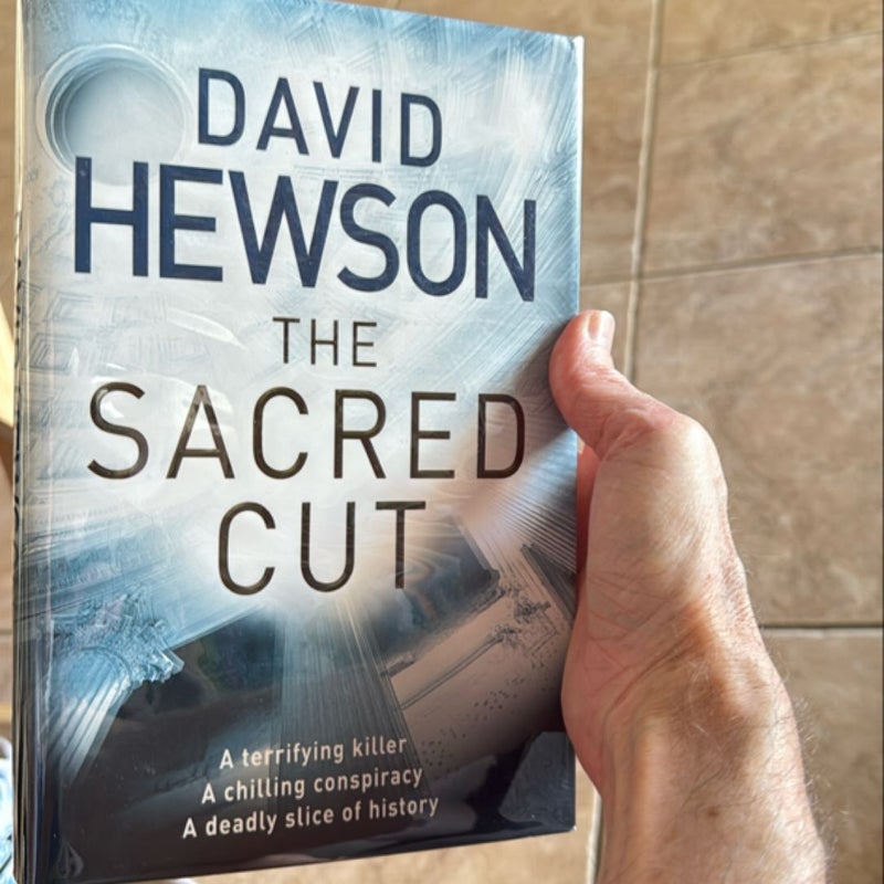 The Sacred Cut SIGNED