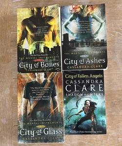 The Mortal Instuments books 1-4. City of bones. City of ashes. City of glass. City of fallen angels