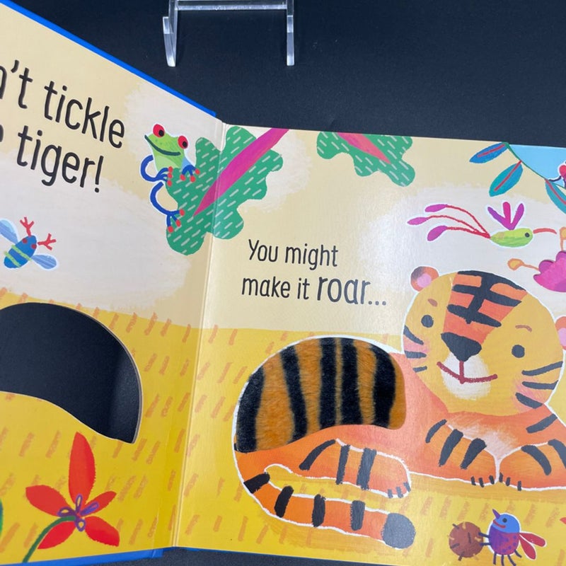 Usborne touchy feely sounds don’t tickle the tiger ! Board book