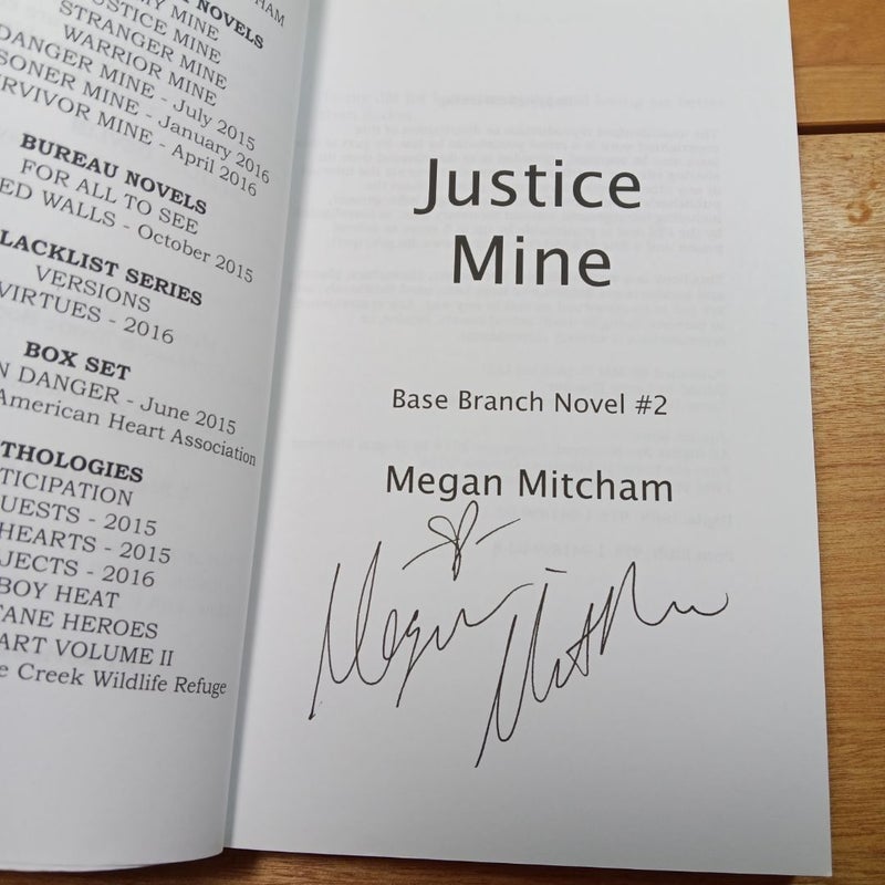 (Signed) Justice Mine