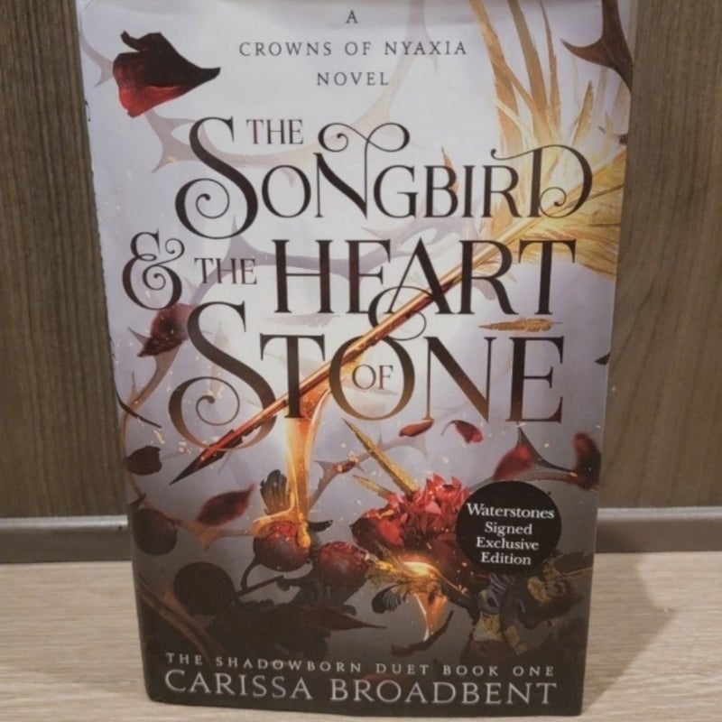 Signed A songbird and the heart of stone