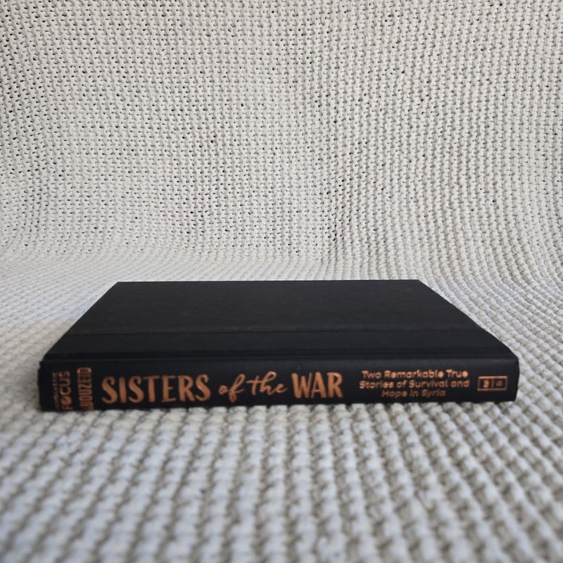 Sisters of the War: Life, Loss, and Hope in Syria (Scholastic Focus)