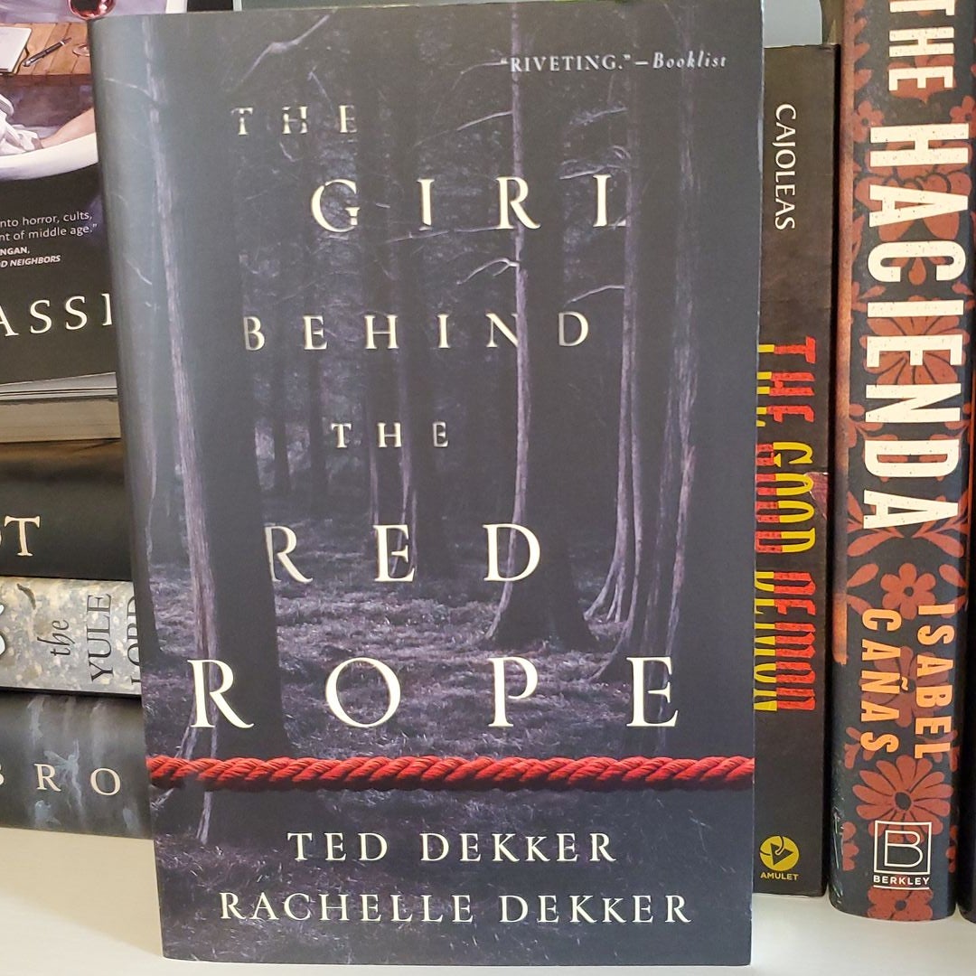 The Girl Behind the Red Rope