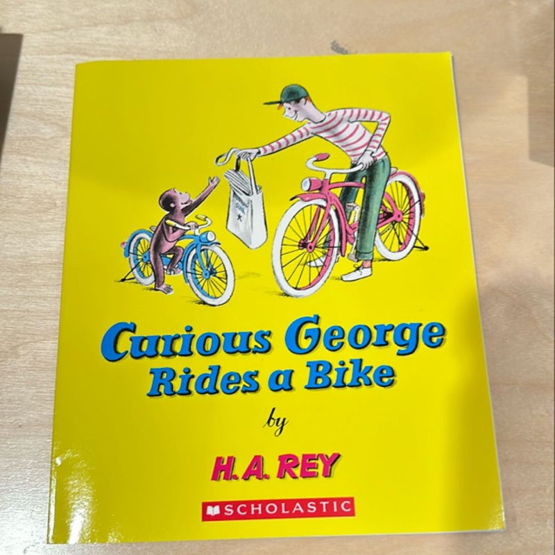 Curious George Rides a Bike