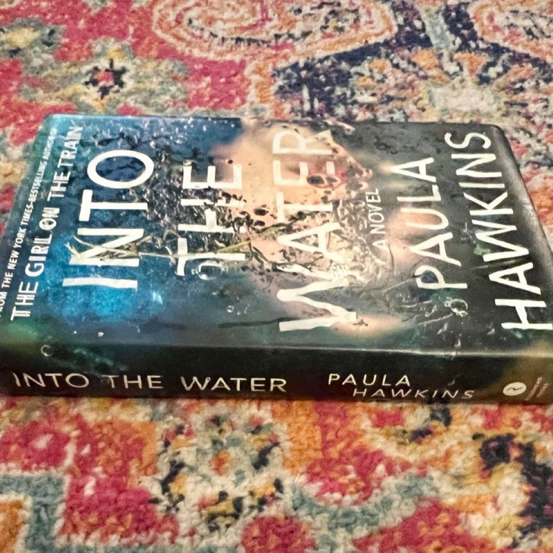 Into The Water by Paula Hawkins  Hardcover  (2017) Excellent