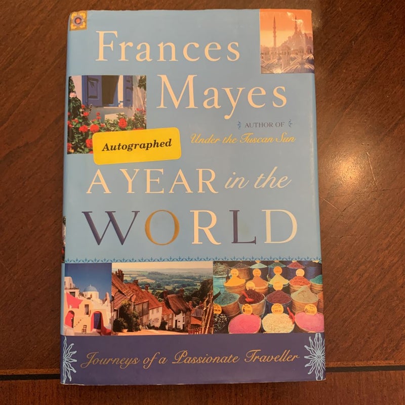 A Year in the World (SIGNED / First Ed.)