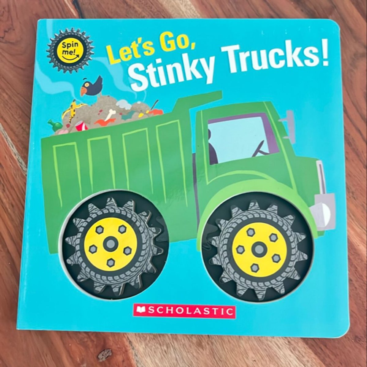 Let's Go, Stinky Trucks! (Spin Me!) by Scholastic