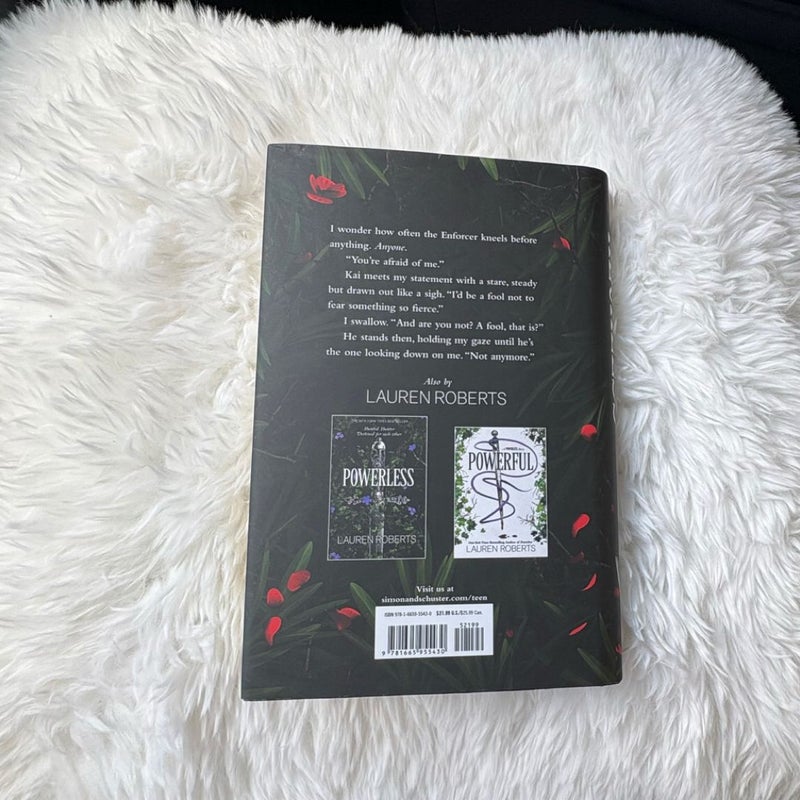 Two Hardback Books: Powerless + Reckless