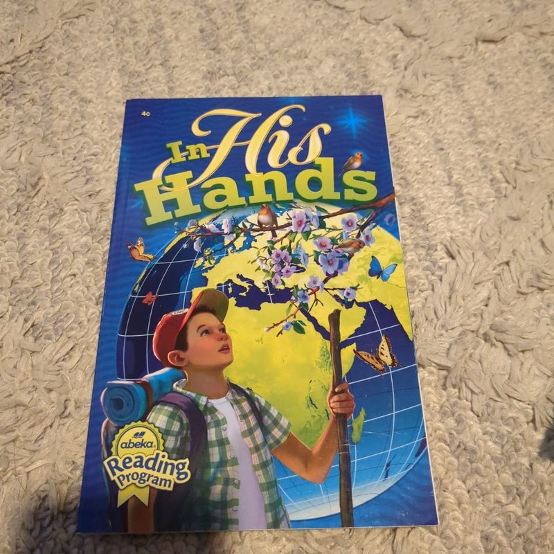 In his hands