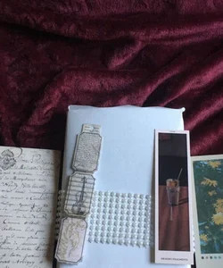 Mystery  romance book w/extra accessories 