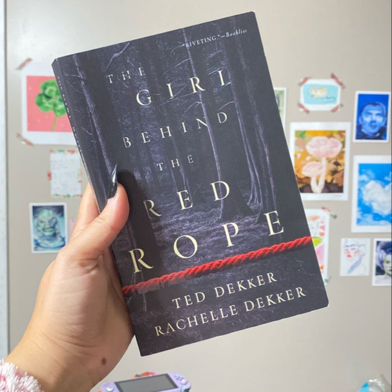 The Girl Behind the Red Rope