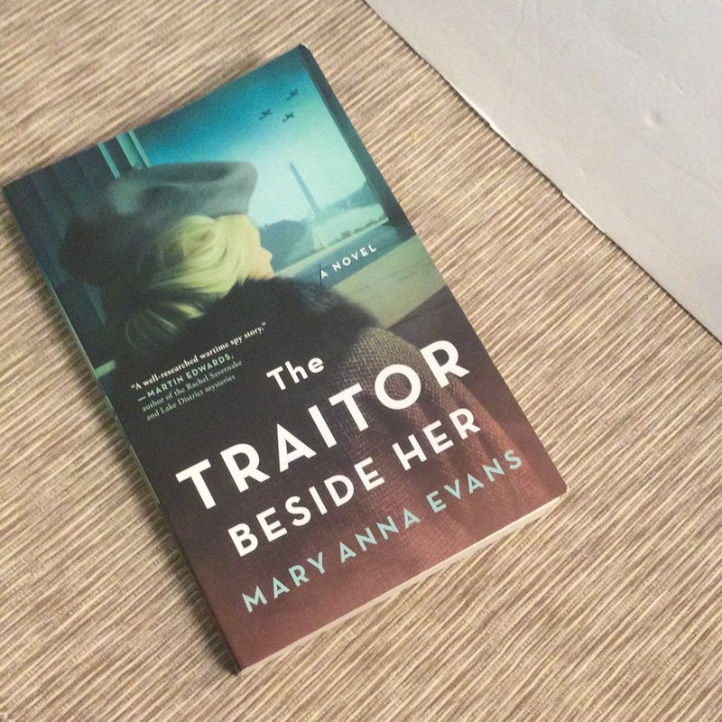 The Traitor Beside Her